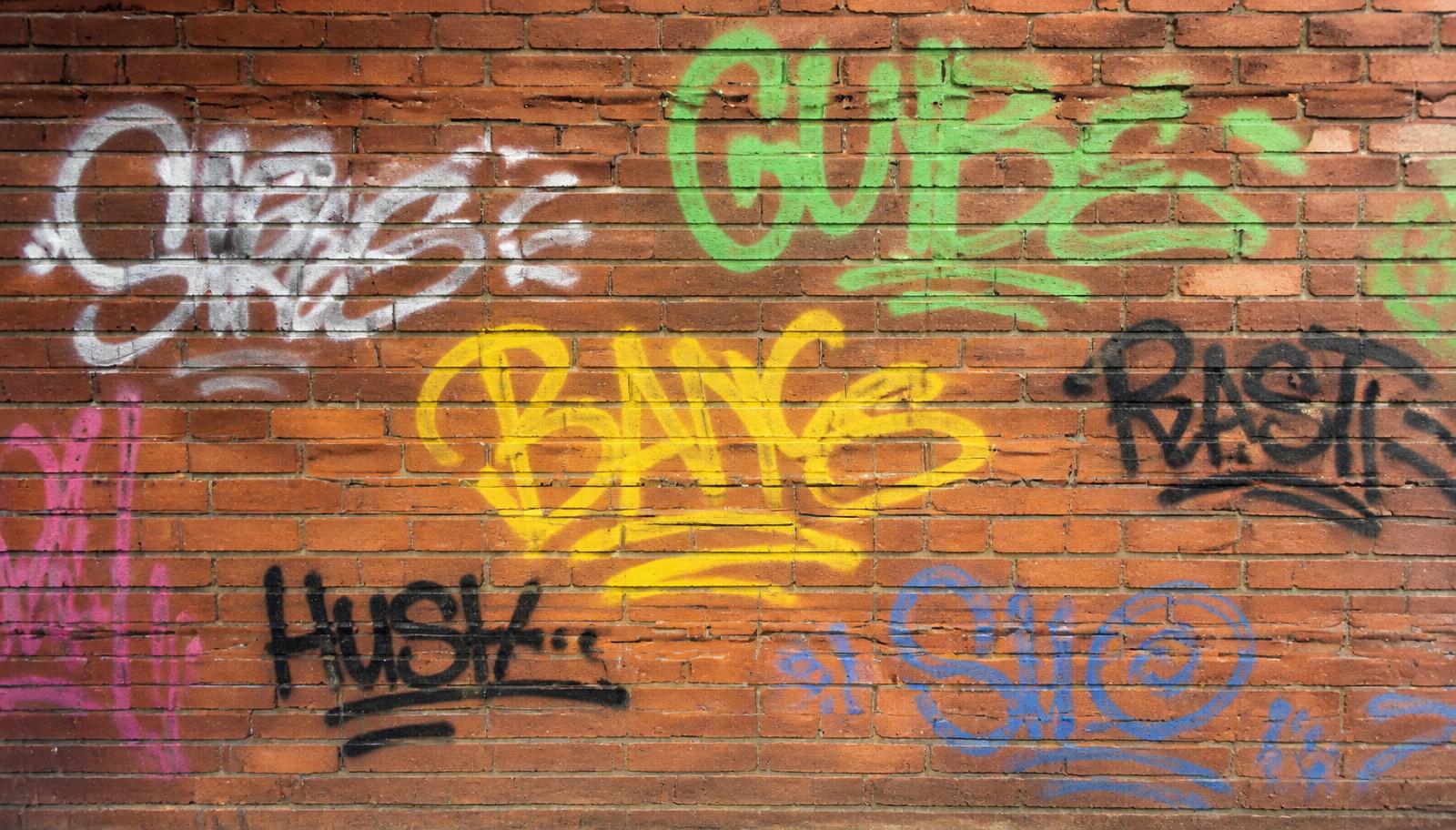 Chemical graffiti removal on a brick wall in Fairfield County, CT